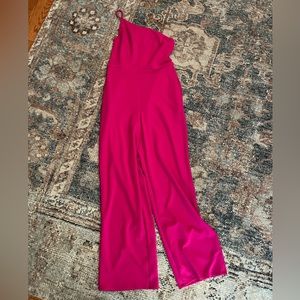 Crystal Sky one shoulder Medium, hot pink jumpsuit. Worn once. I’m 5’10, 145lbs,